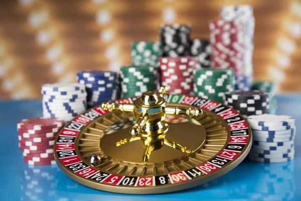 Live dice game dealer rolling two dice on felt table with multiple camera angles visible